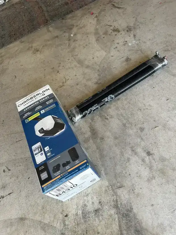 New Chamberlain opener and spring parts ready for install
